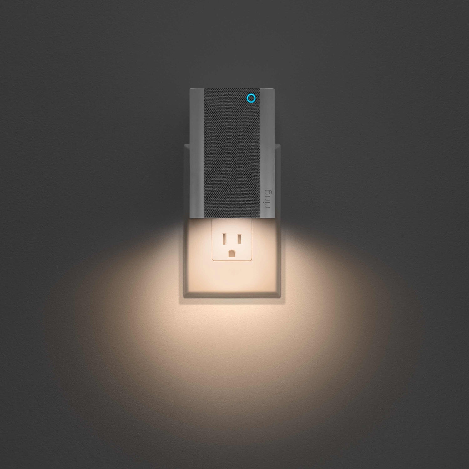 Chime Pro - Ring Chime Pro plugged into a wall outlet, illuminating the wall below it with built-in automatic nightlight.