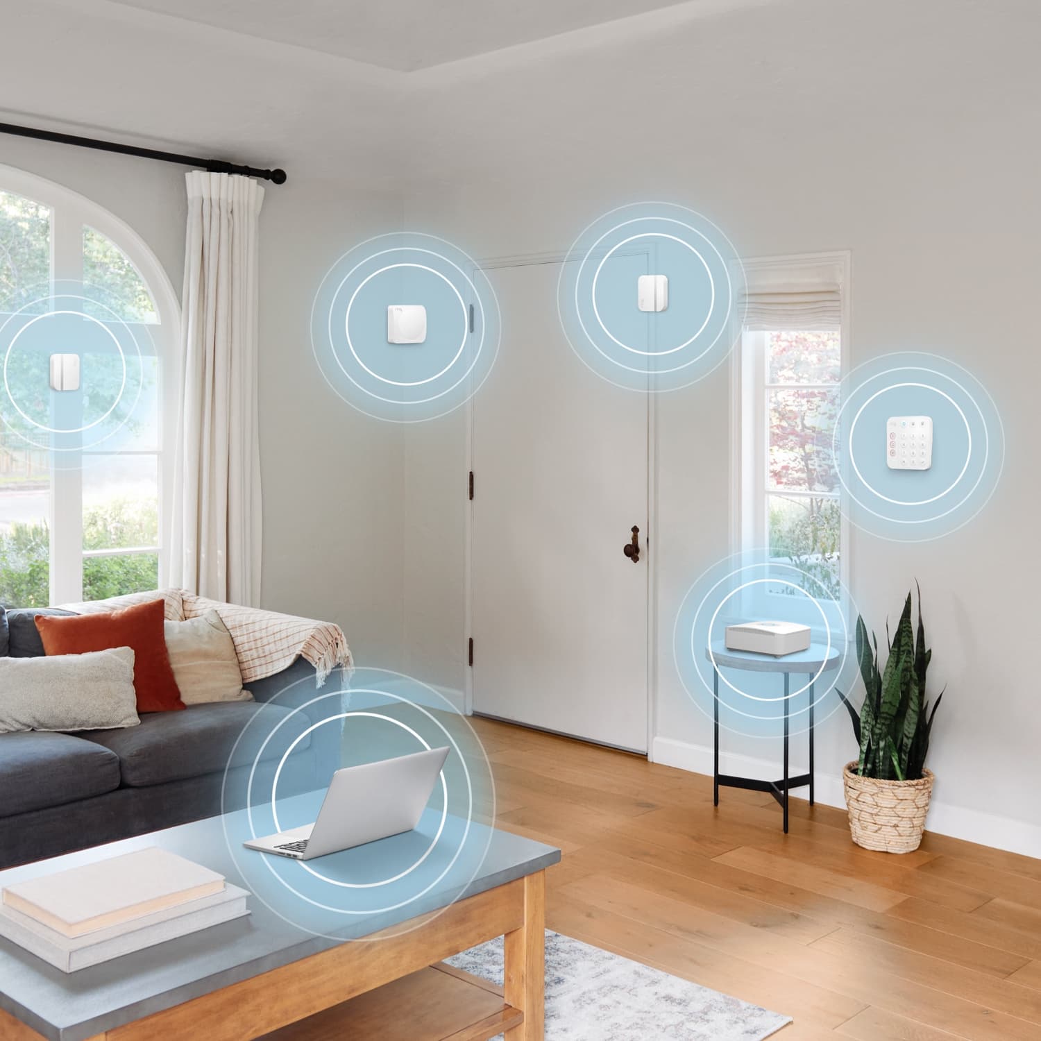 Alarm Security Kit, 8-Piece (Certified Refurbished) - Modern living room with Ring Alarm Security Kit devices highlighted, showing connected sensors, keypad, and base station.