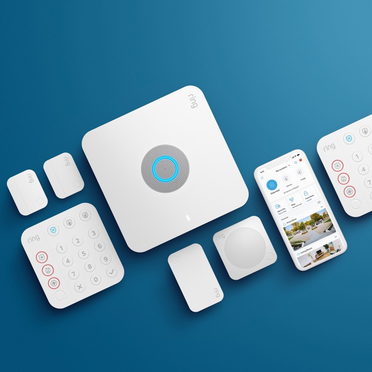 Ring Alarm home security components and app interface displayed on blue background.