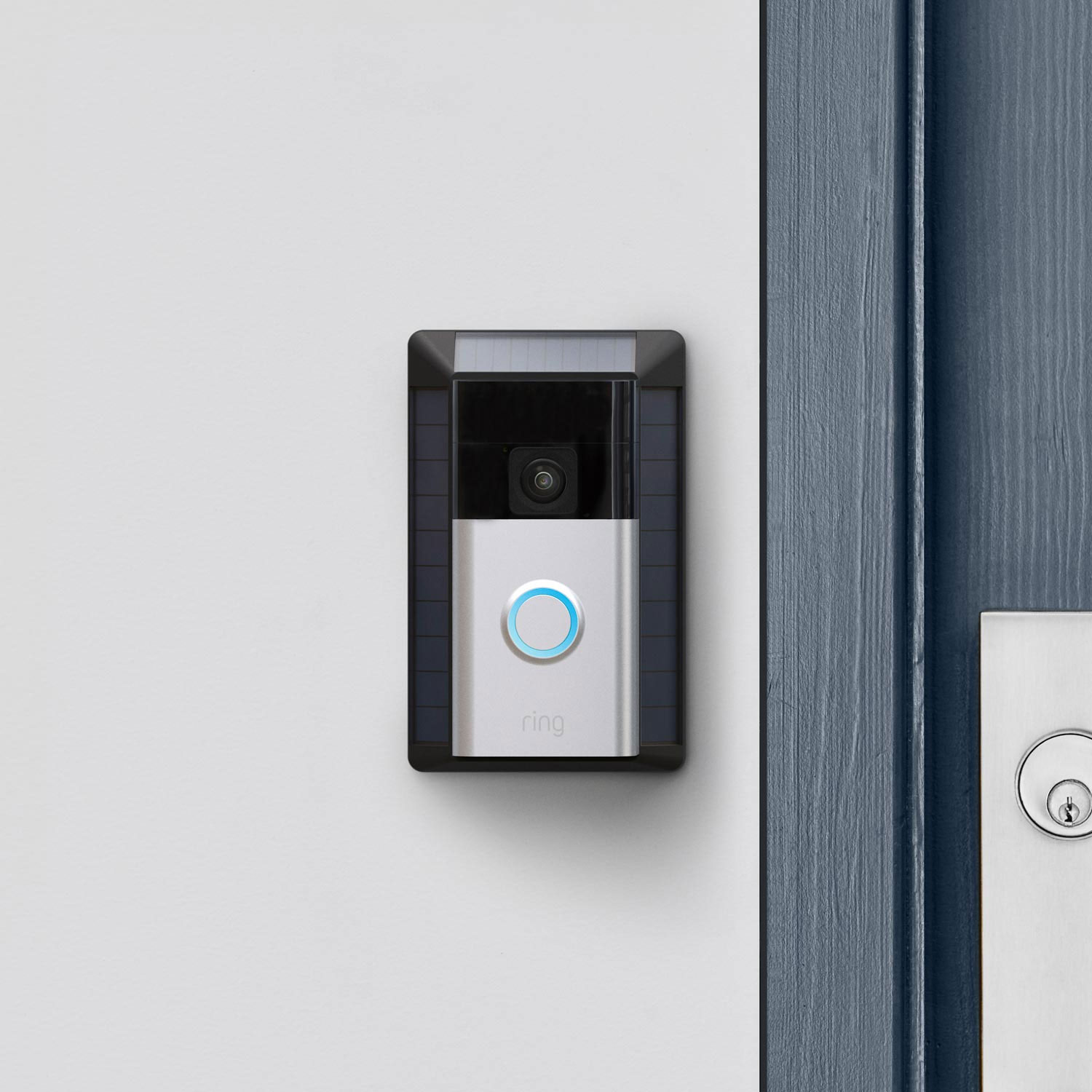 Solar Charger for Battery Doorbell (Battery Doorbell) - Ring Battery Doorbell with Solar Charger mounted by front door, showing camera, button, and built-in solar panels.