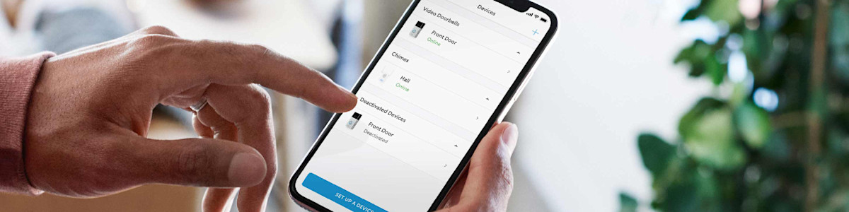 Hand scrolling through Ring device list on phone screen