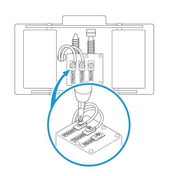 Illustration of a screwdriver inserted into the terminal screws on the internal doorbell showing how to loosen the screws holding the doorbell wires. 